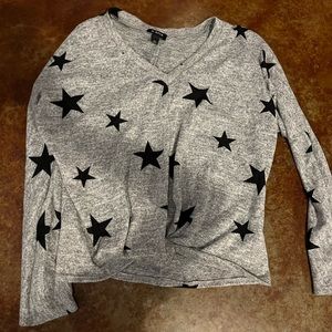 Womens xl grey and black star shirt. Has a twist in middle bottom .